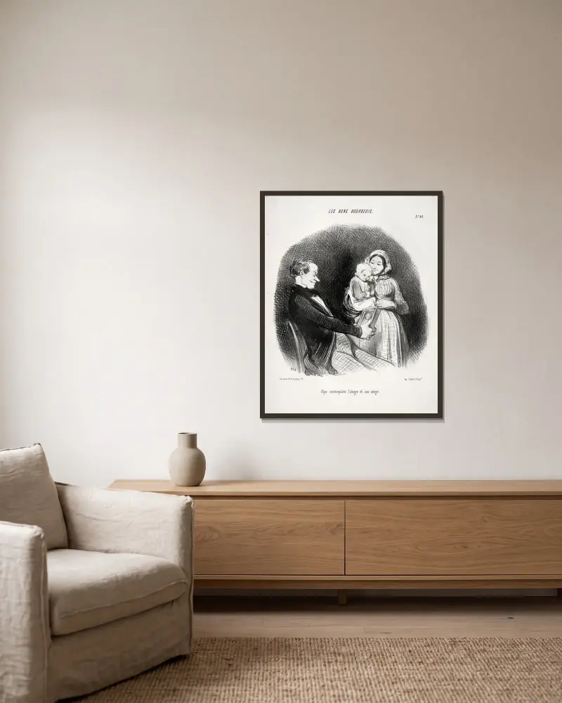 Pappa betraktar en avbild av sin avbild av Honoré Daumier inramad på en vägg