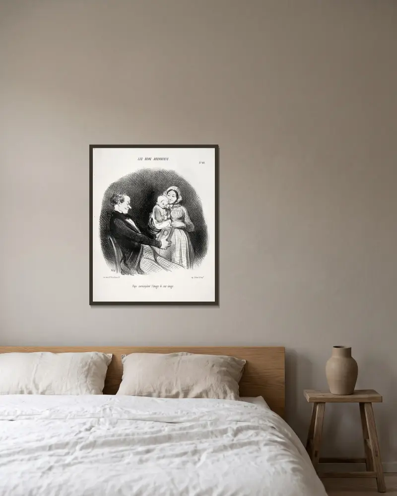 Pappa betraktar en avbild av sin avbild av Honoré Daumier inramad på en vägg