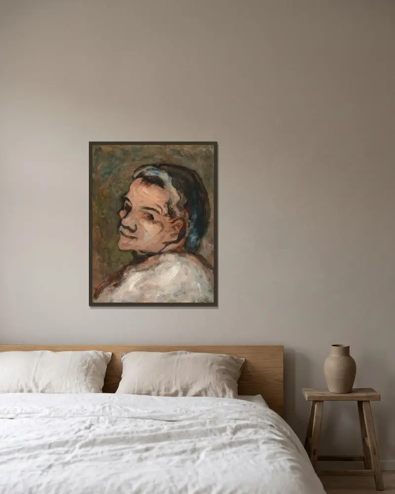 Tête de Scapin av Honoré Daumier inramad på en vägg