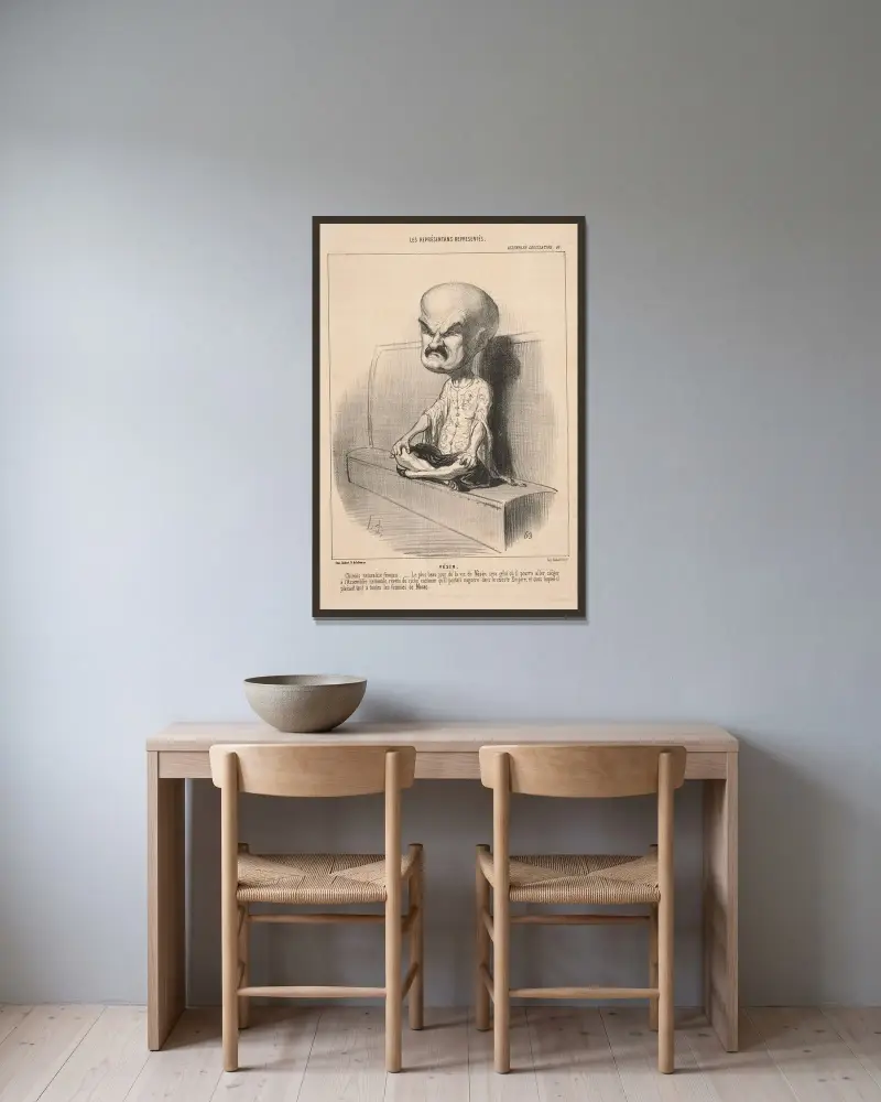 Kinesisk figur sittande på bänk med korslagda ben av Honoré Daumier inramad på en vägg