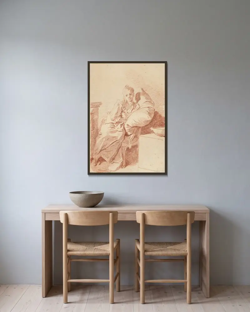 Ung flicka sittande i ett rum, lutad mot en kudde (”Den unga sjuka”) av Jean-Honoré Fragonard inramad på en vägg