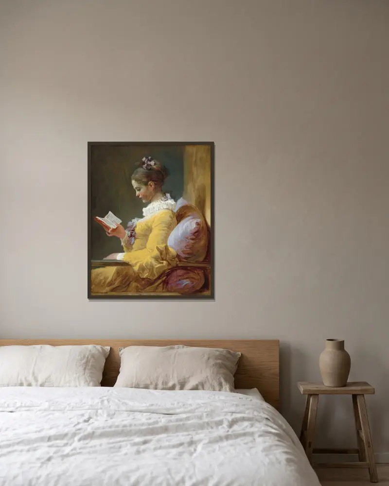Young Girl Reading av Jean-Honoré Fragonard inramad på en vägg