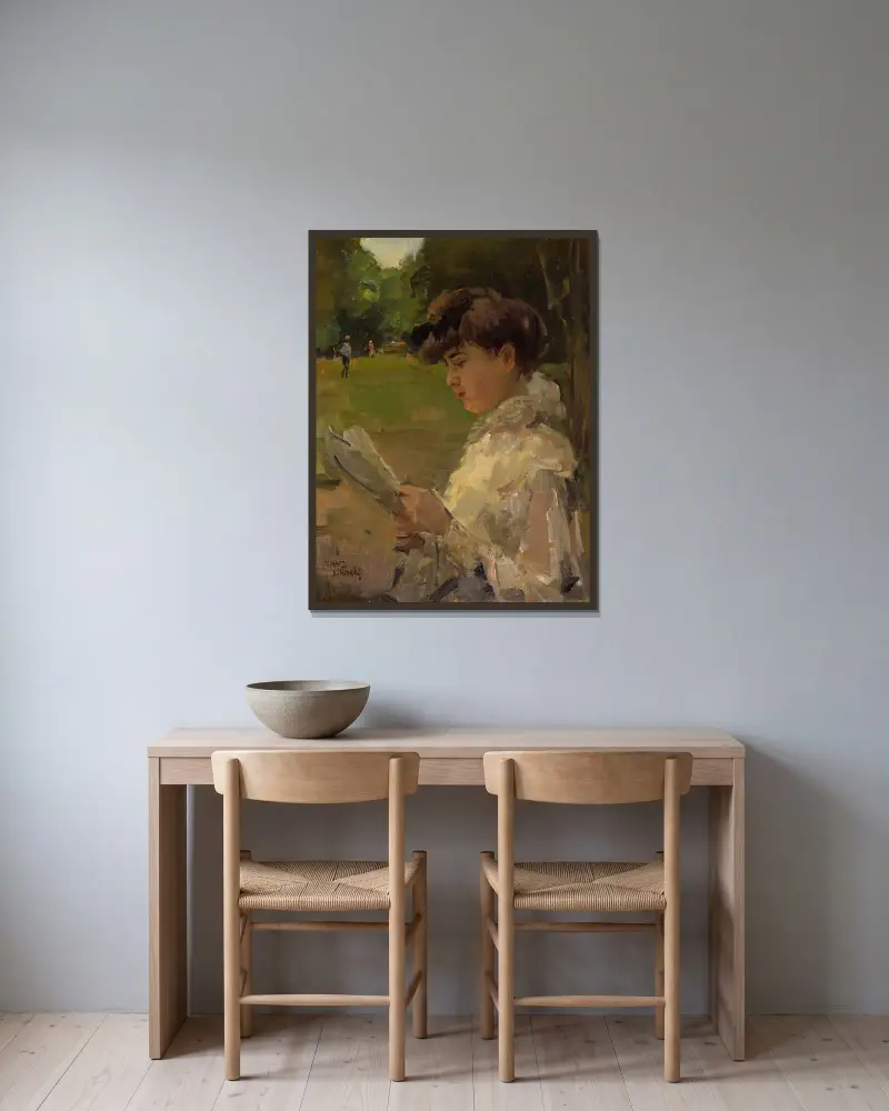 Lesendes Mädchen von Isaac Israëls gerahmt an einer Wand