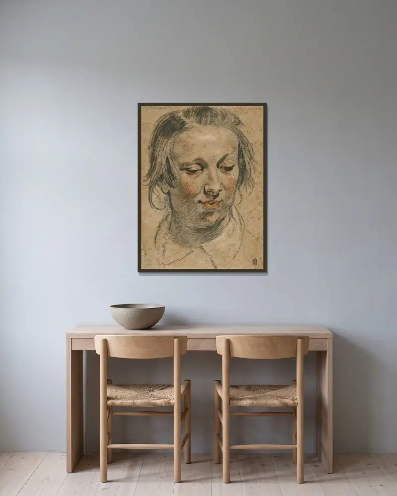 Kvinnohuvud av Jacob Jordaens inramad på en vägg