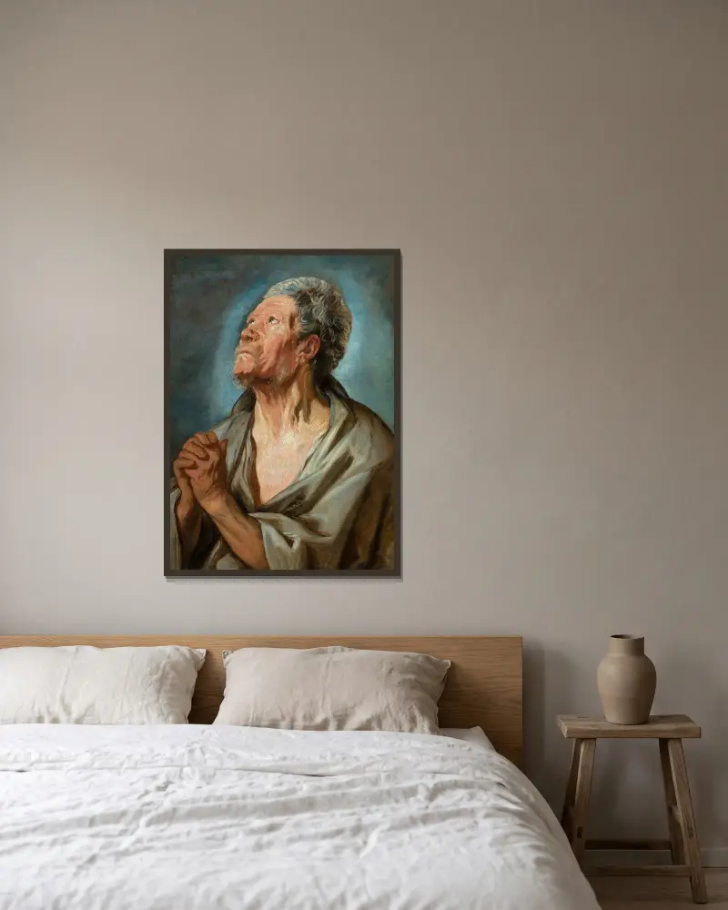 Studie av en gammal man med knäppta händer av Jacob Jordaens inramad på en vägg