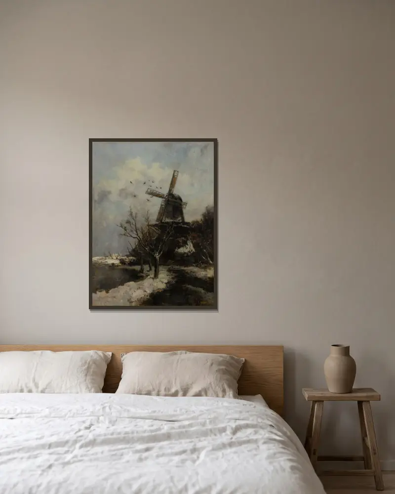 Väderkvarn vid en bäck i vinterlandskap av Jacob Maris inramad på en vägg