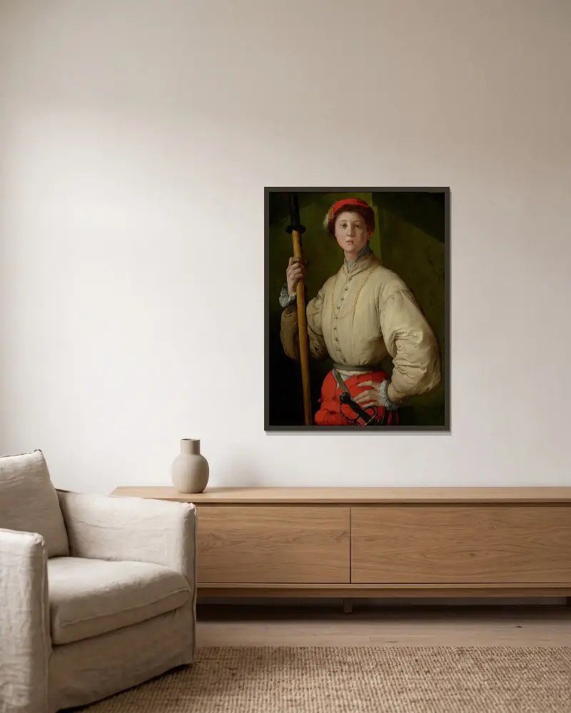 Portrait of a Halberdier av Pontormo (Jacopo Carucci) inramad på en vägg