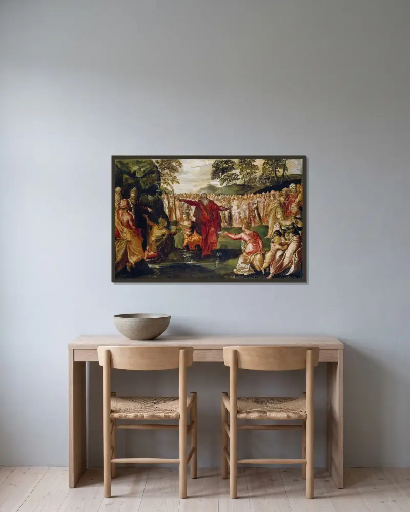Moses slår vatten ur klippan av Jacopo Tintoretto inramad på en vägg