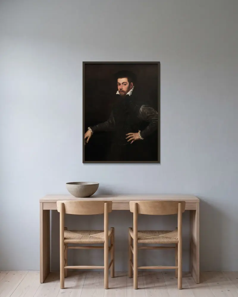 Bildnis eines Edelmannes von Jacopo Tintoretto gerahmt an einer Wand