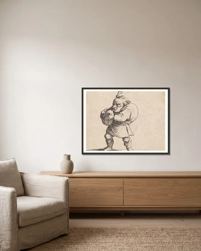 Der Dudelsackpfeifer von Jacques Callot gerahmt an einer Wand