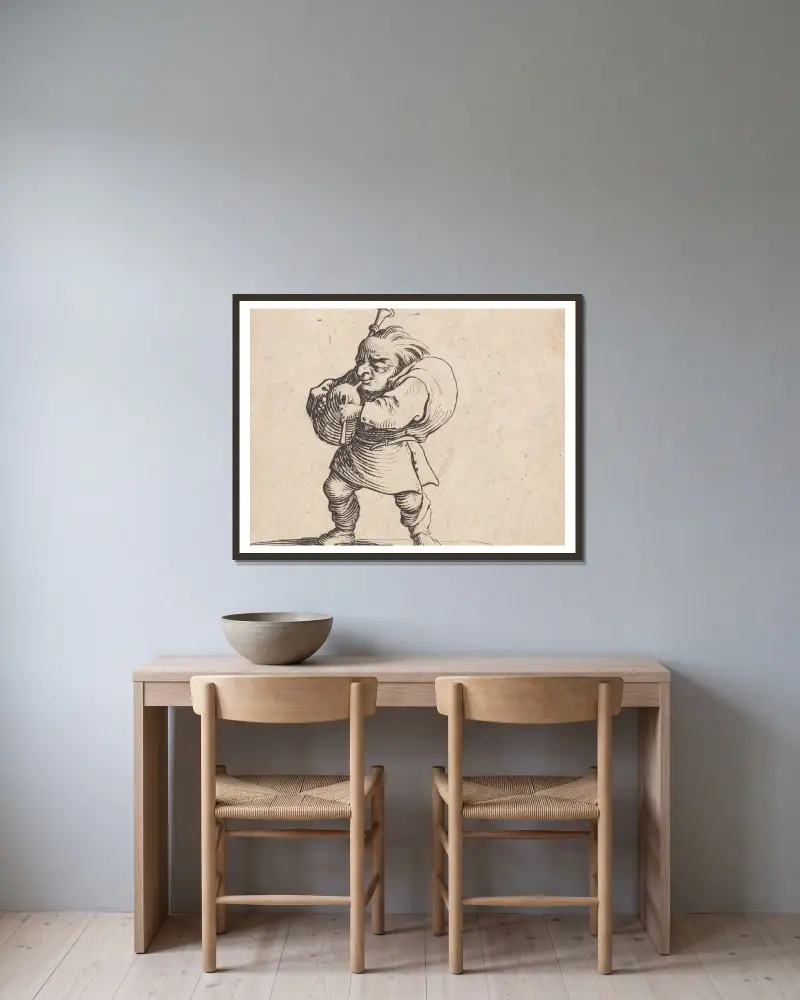 Der Dudelsackpfeifer von Jacques Callot gerahmt an einer Wand