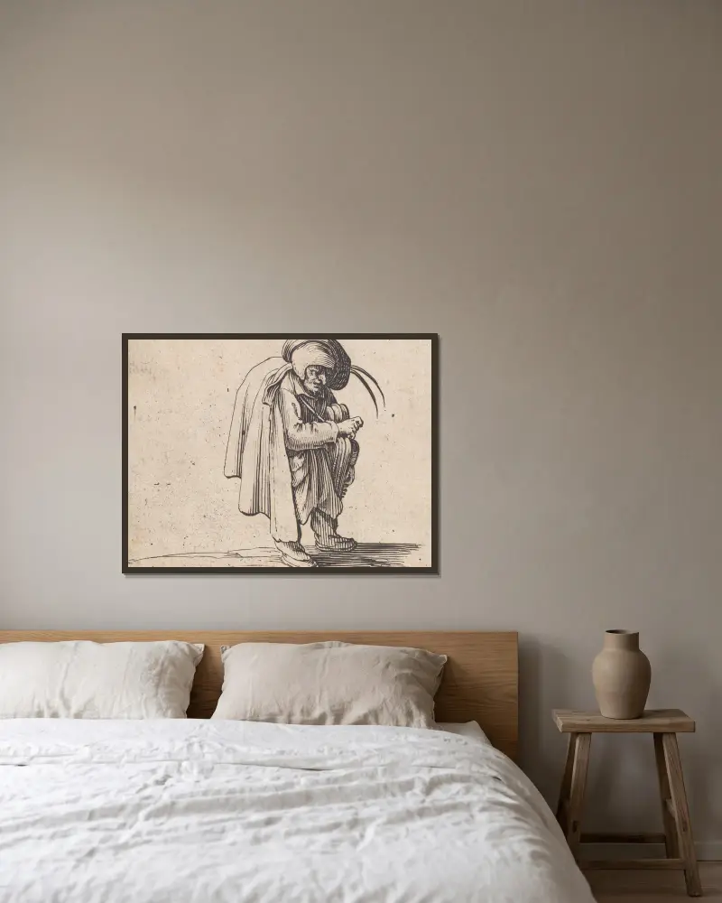 Der Drehleierspieler von Jacques Callot gerahmt an einer Wand