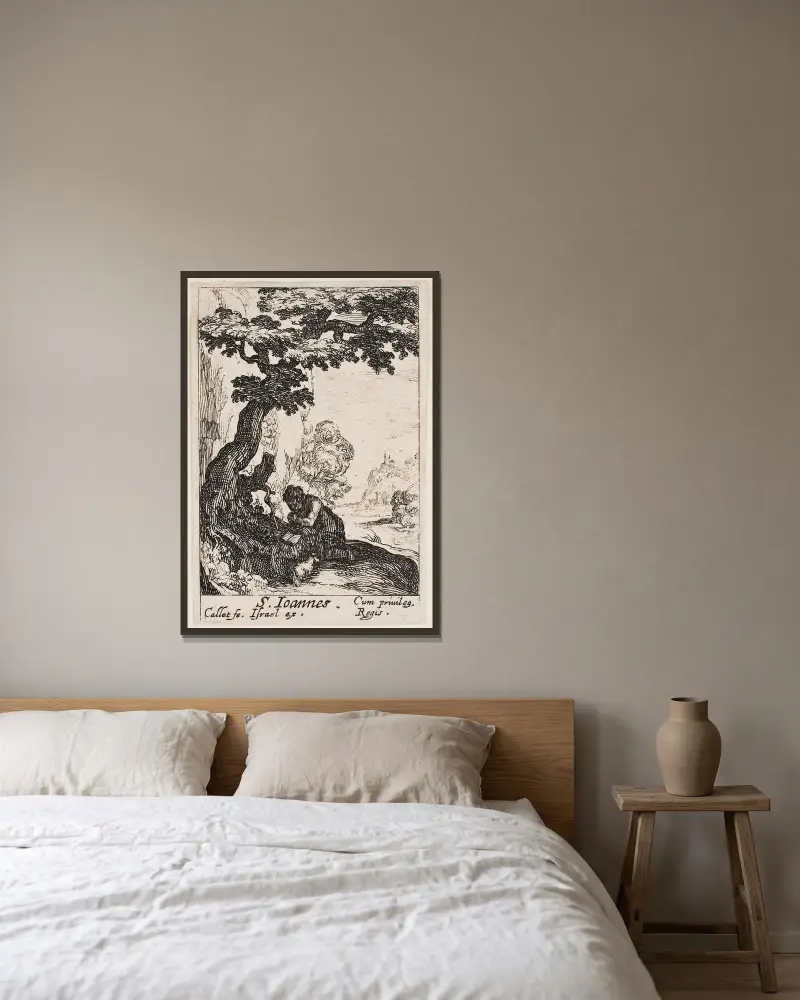 Johannes Döparen av Jacques Callot inramad på en vägg