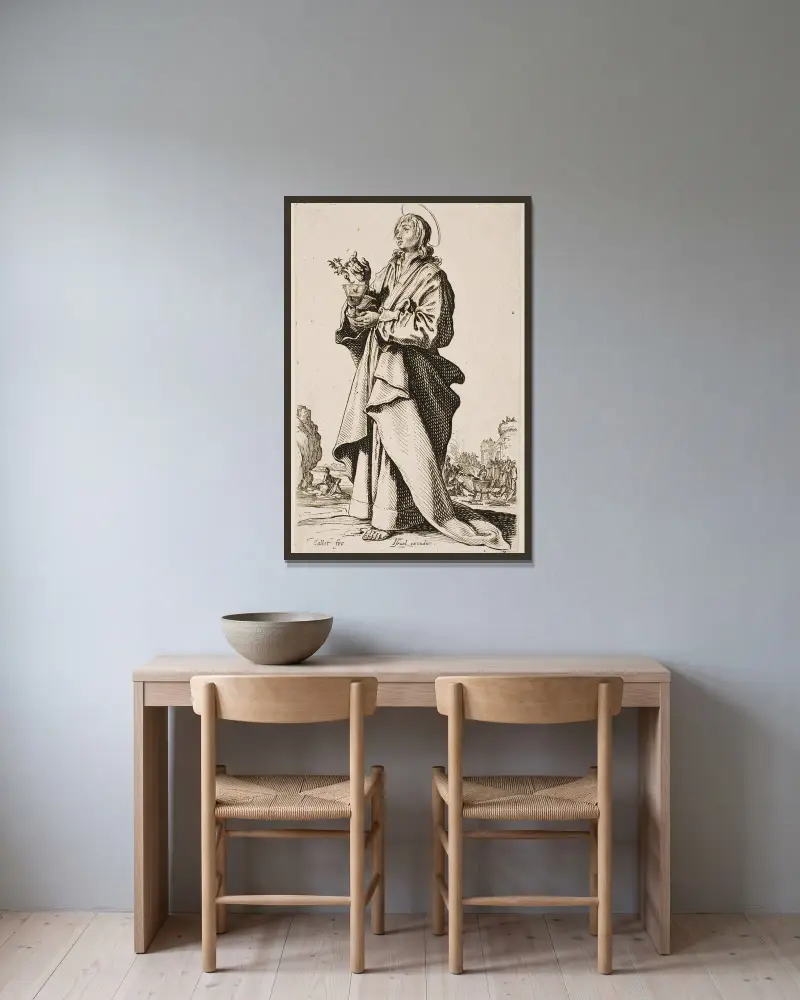 Johannes der Evangelist von Jacques Callot gerahmt an einer Wand
