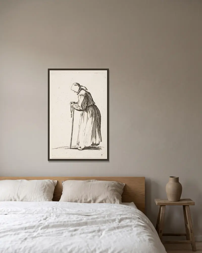 Tiggaren med rosenkrans av Jacques Callot inramad på en vägg