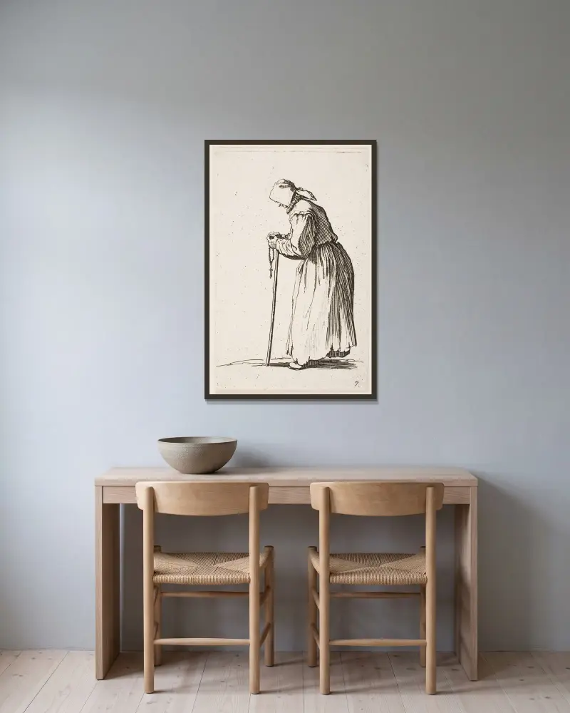 Tiggaren med rosenkrans av Jacques Callot inramad på en vägg