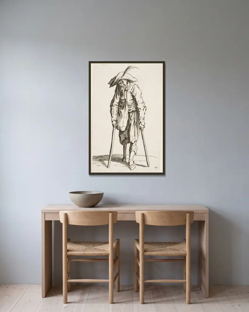Tiggaren med träbenet av Jacques Callot inramad på en vägg