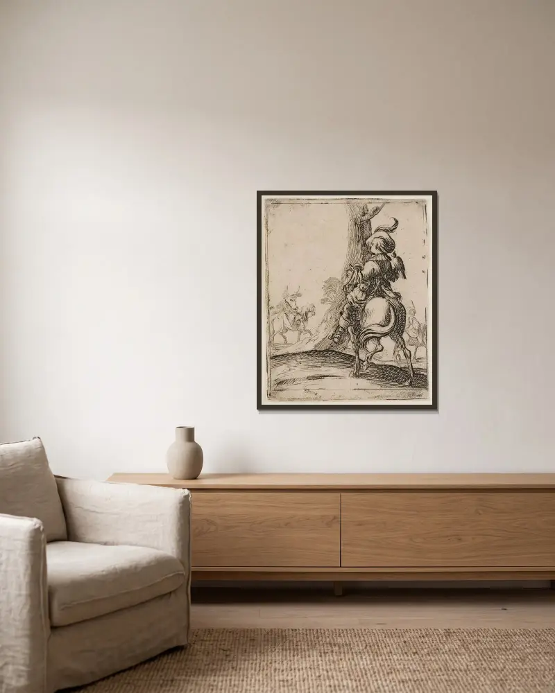 Falkeneraren av Jacques Callot inramad på en vägg