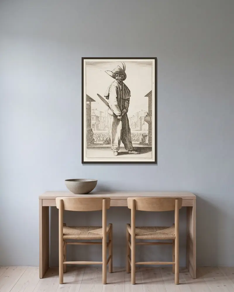 Zanni av Jacques Callot inramad på en vägg