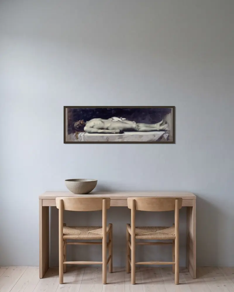 Kristus i graven av Jean-Jacques Henner inramad på en vägg