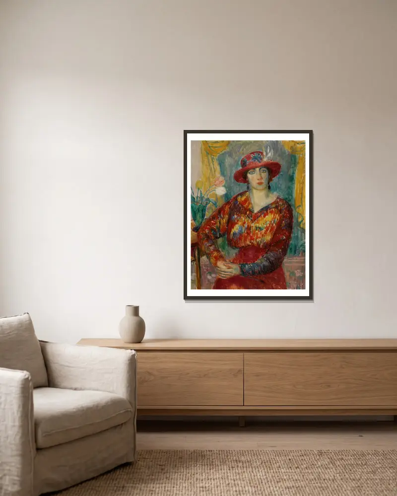 Frau in roter Bluse mit Tulpen von William James Glackens gerahmt an einer Wand