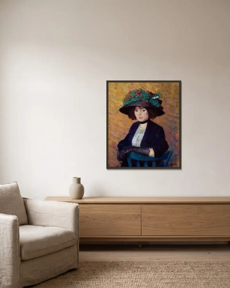 Kvinna med grön hatt av William James Glackens inramad på en vägg