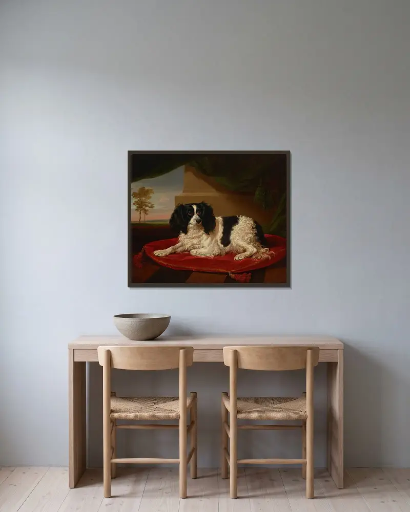 En King Charles-spaniel på en röd kudde av James Ward inramad på en vägg
