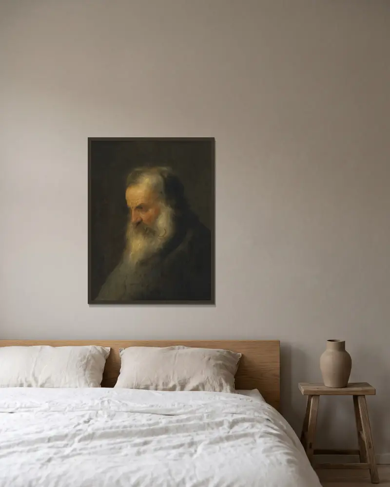 Head of a bearded man av Jan Lievens inramad på en vägg