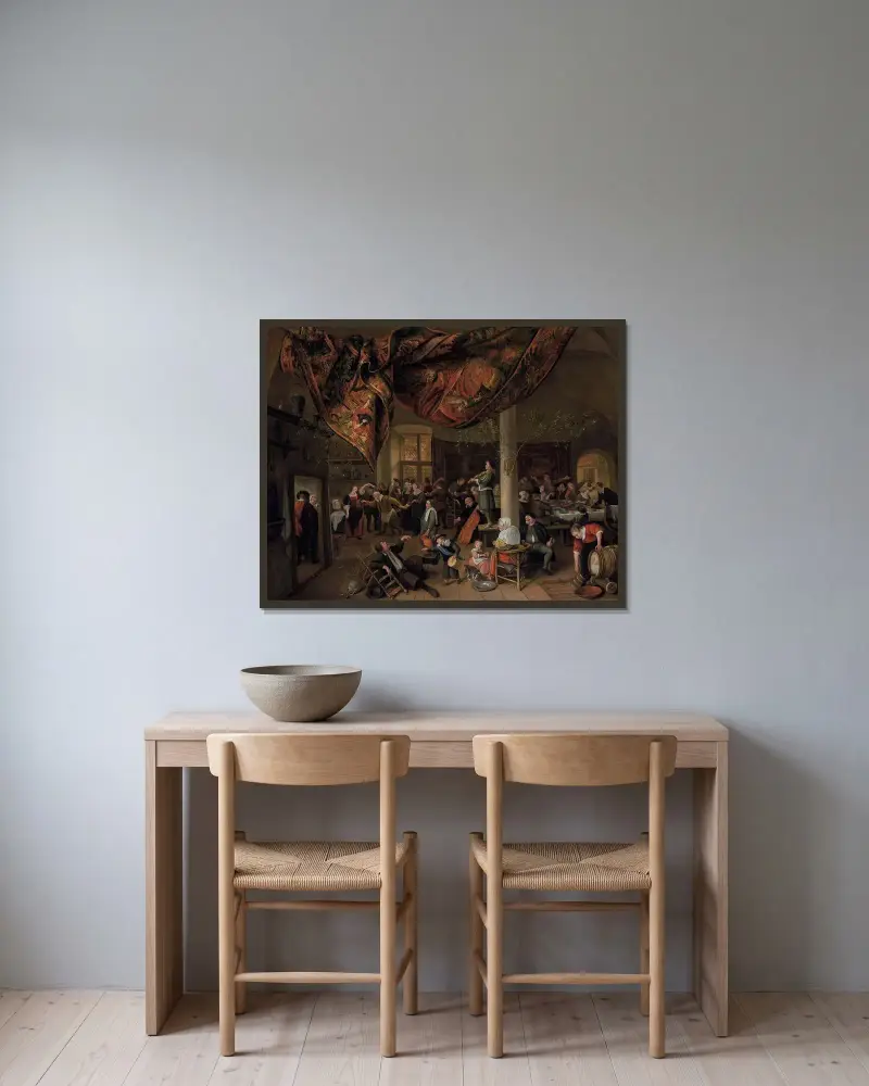 En bybröllop av Jan Steen inramad på en vägg