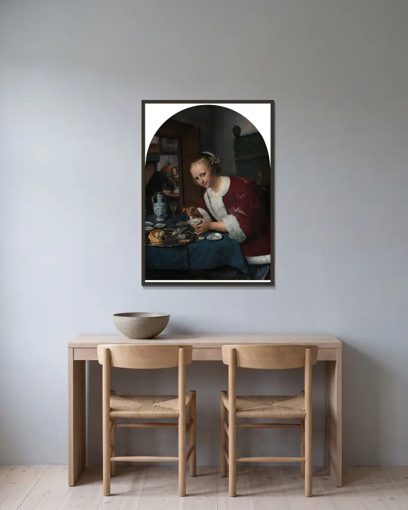 Girl Eating Oysters av Jan Steen inramad på en vägg