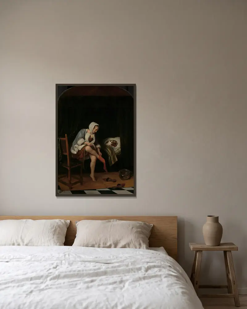 Kvinna vid sin toalett av Jan Steen inramad på en vägg