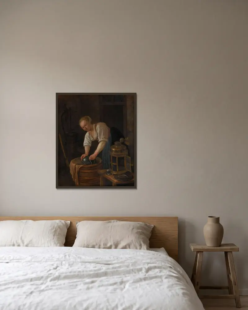 Kvinna skurar metallkärl av Jan Steen inramad på en vägg