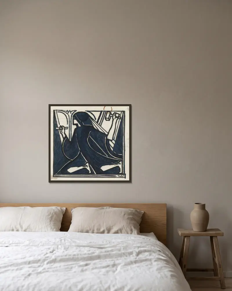 Knäböjande figur med hammare och mejsel av Jan Toorop inramad på en vägg