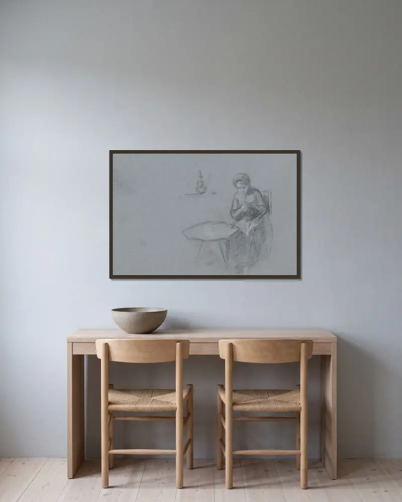 Handarbetande kvinna vid ett bord av Jan Veth inramad på en vägg