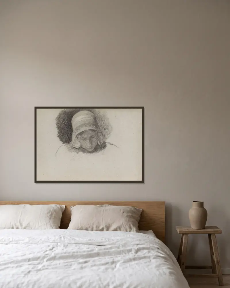 Kopia av en flicka med bondmössa av Jan Veth inramad på en vägg