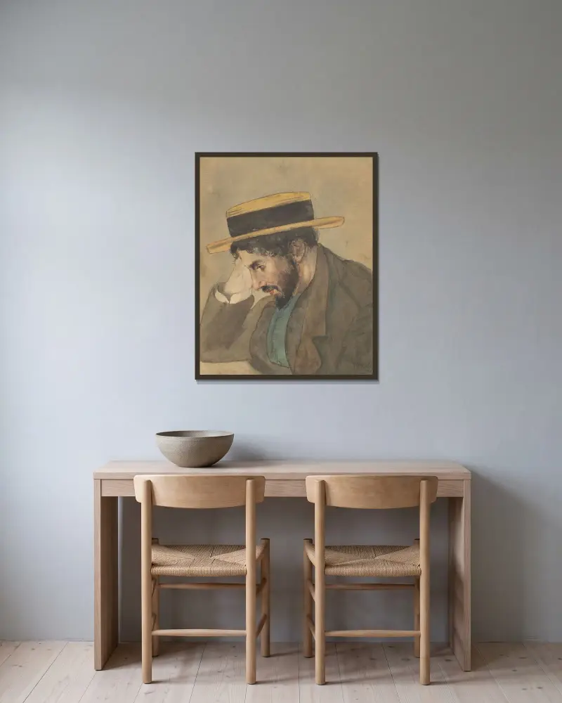 Porträtt av en ung man med stråhatt av Jan Veth inramad på en vägg