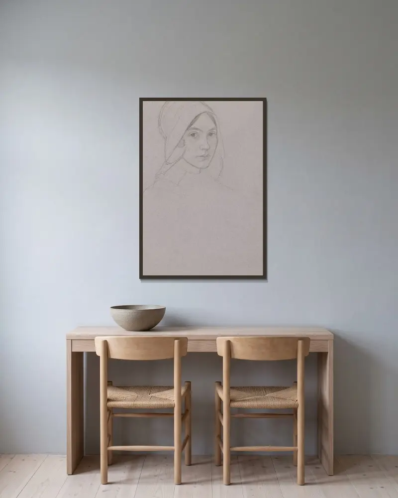 Porträtt av en flicka med huva av Jan Veth inramad på en vägg