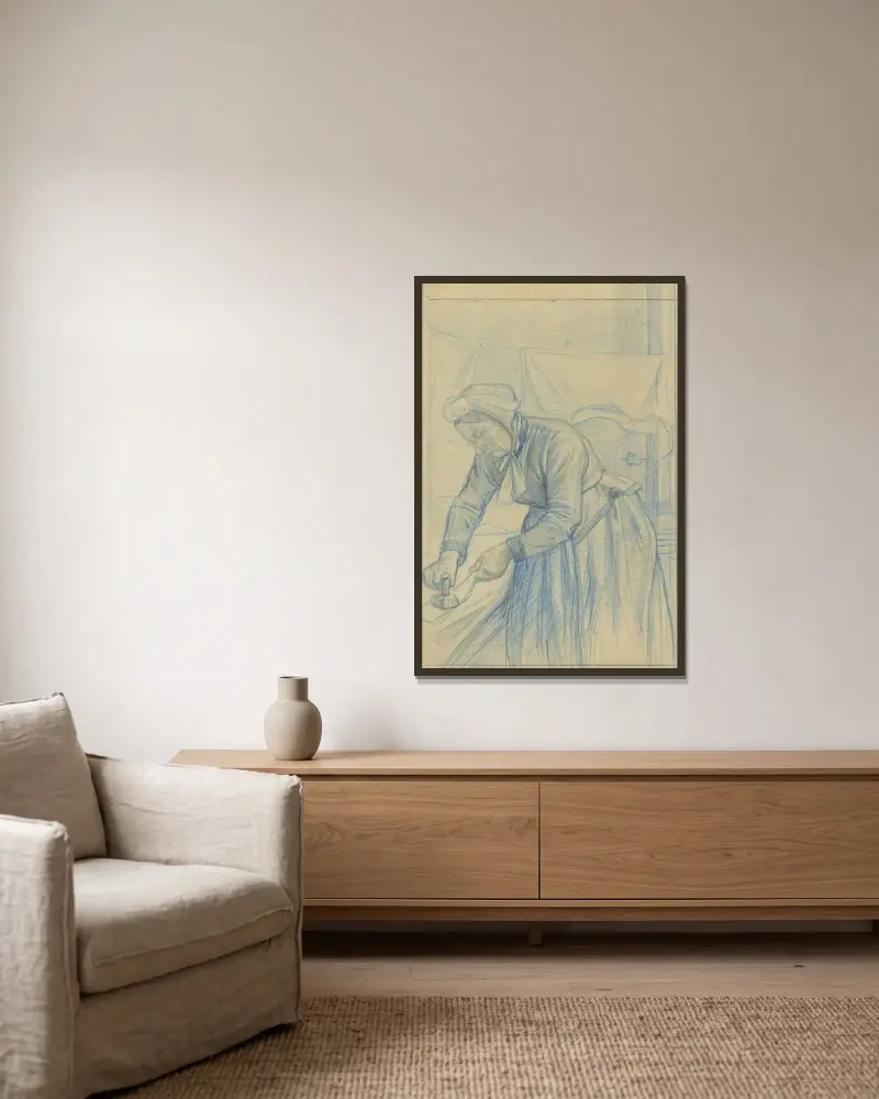 Strijkende vrouw von Jan Veth gerahmt an einer Wand