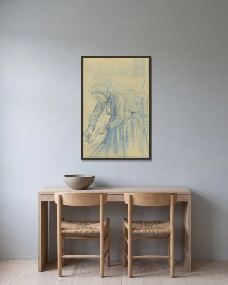 Strijkende vrouw von Jan Veth gerahmt an einer Wand