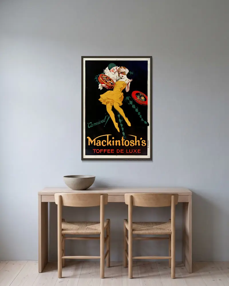 Carnival! Mackintosh’s toffee de luxe av Jean d'Ylen inramad på en vägg