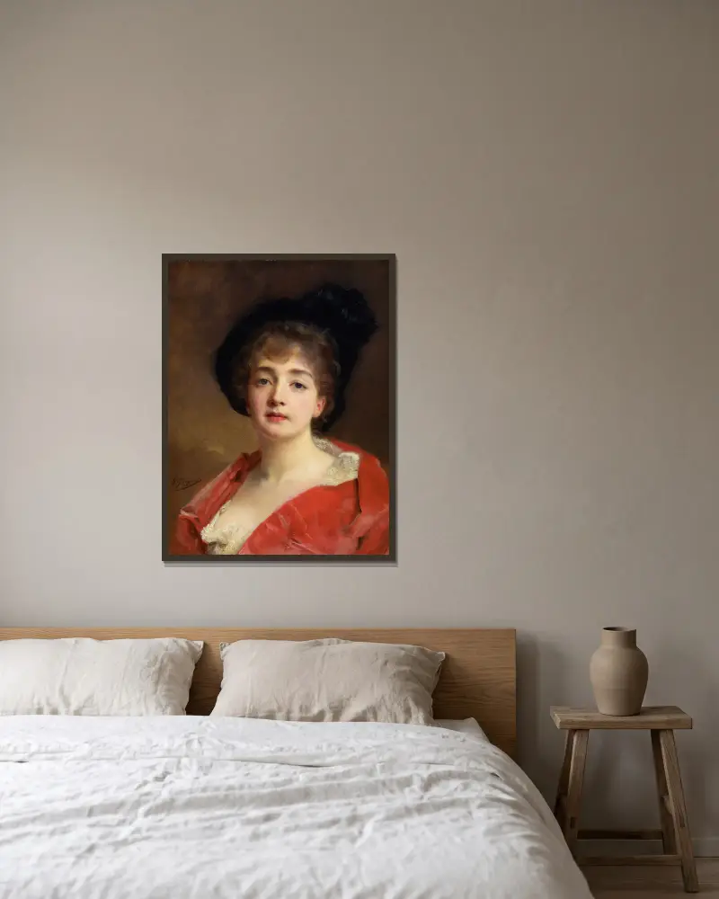 Kvinna i rött av Gustave Jean Jacquet inramad på en vägg
