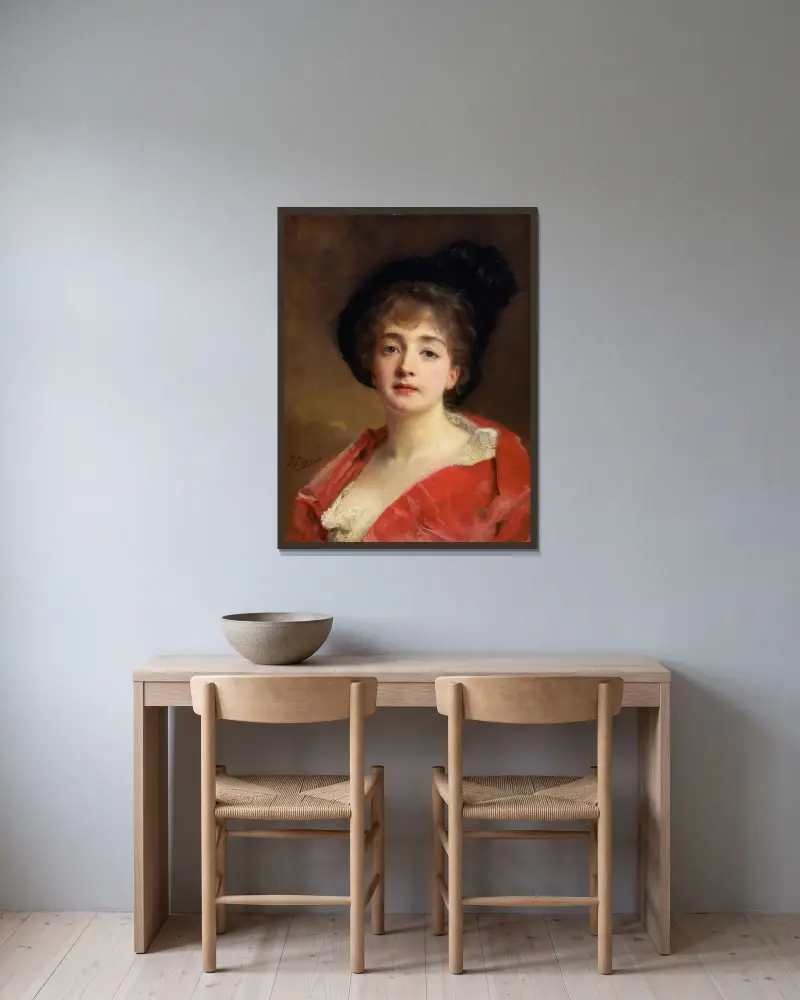 Kvinna i rött av Gustave Jean Jacquet inramad på en vägg