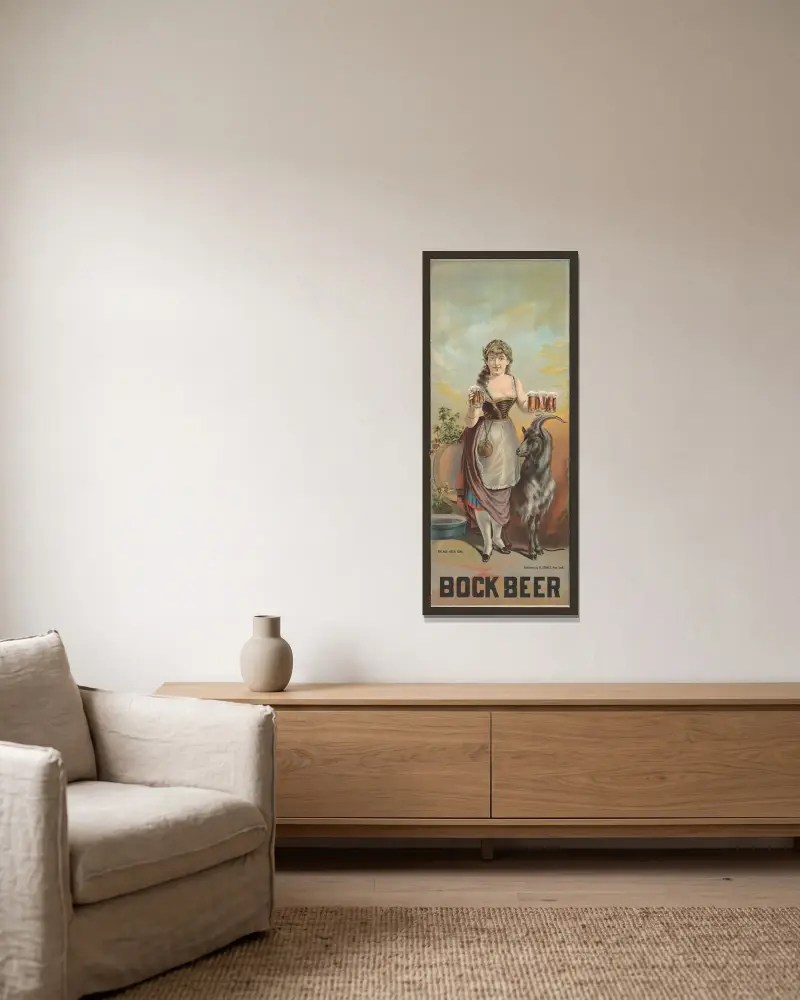 Bockölsposter med byflicka av Henry Jerome Schile inramad på en vägg