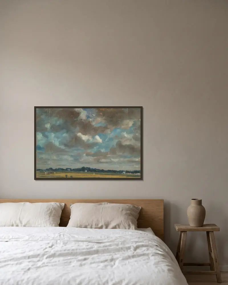 Weite Landschaft mit grauen Wolken von John Constable gerahmt an einer Wand