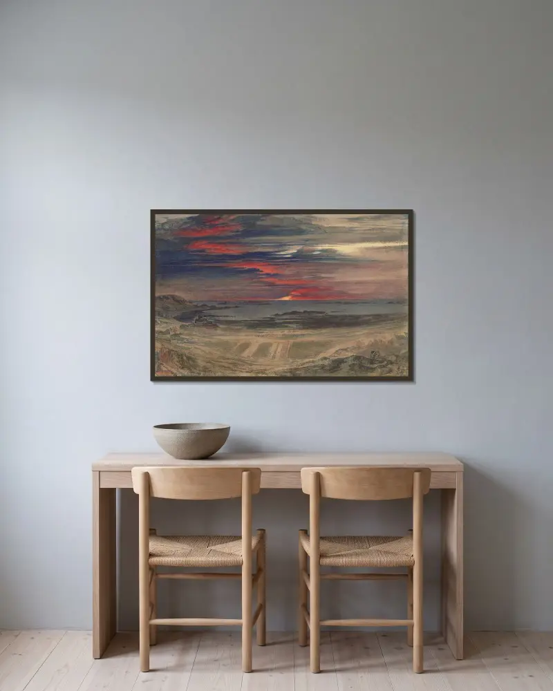 Solnedgång över en klippig vik av John Martin inramad på en vägg