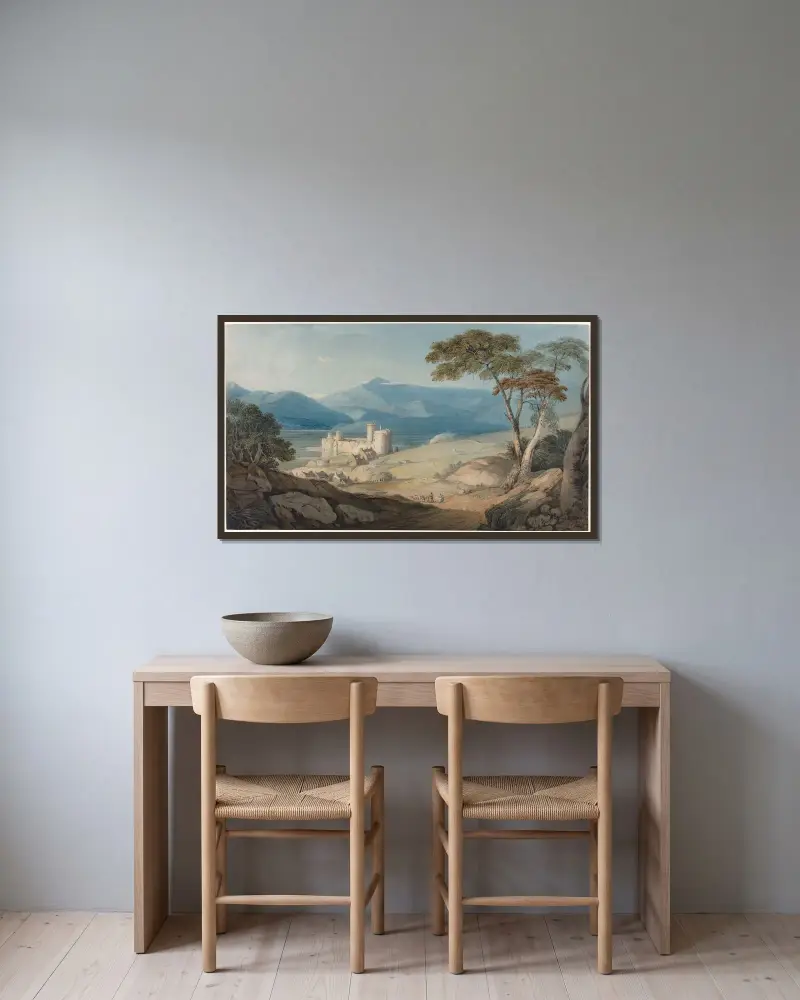 Harlech Castle and Snowdon av John Varley inramad på en vägg
