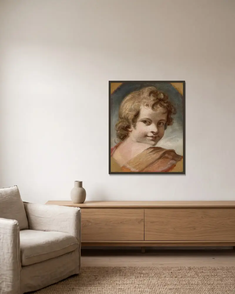 Pojkhuvud av Sir Joshua Reynolds inramad på en vägg