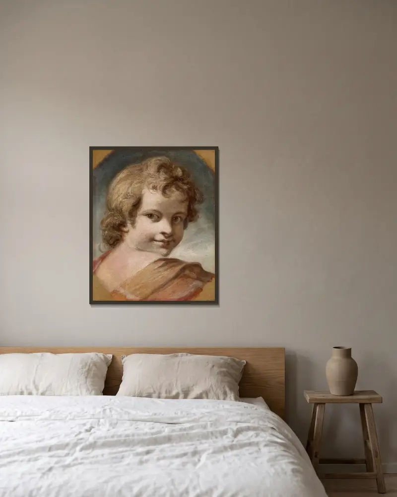 Pojkhuvud av Sir Joshua Reynolds inramad på en vägg