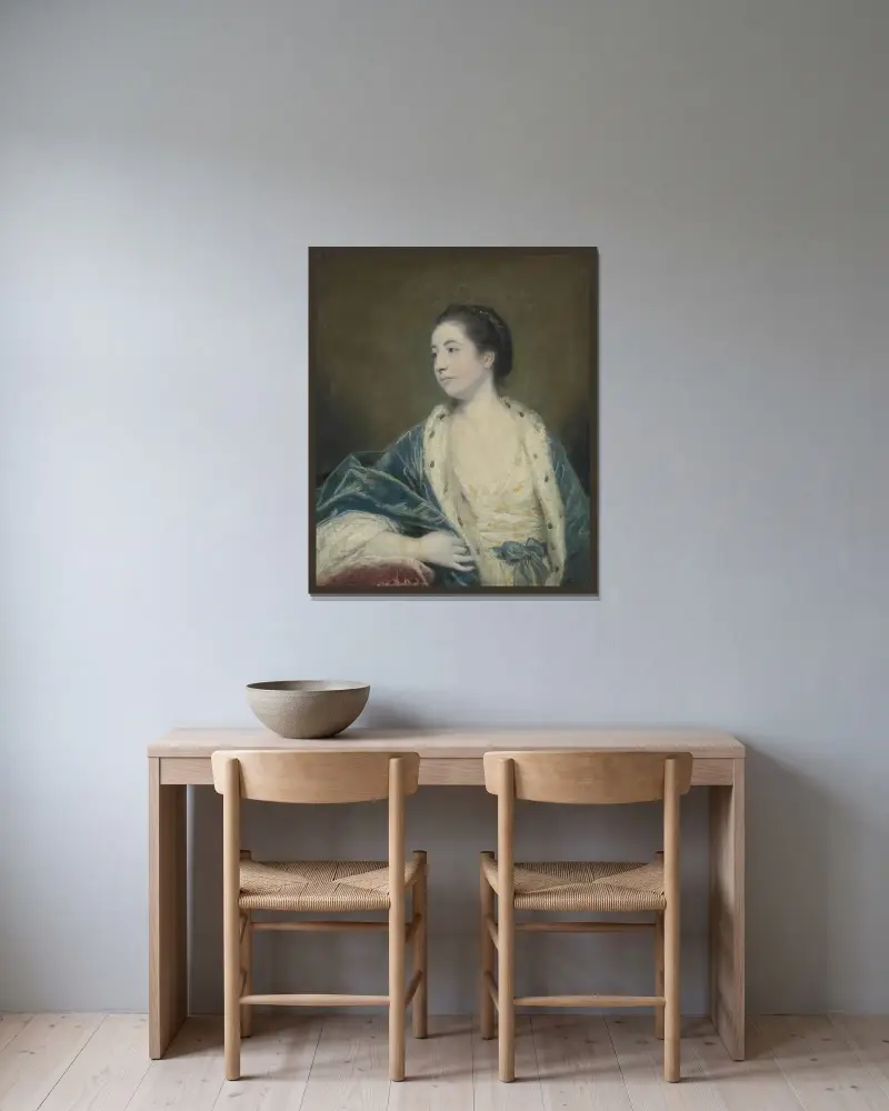 Porträtt av en kvinna av Sir Joshua Reynolds inramad på en vägg
