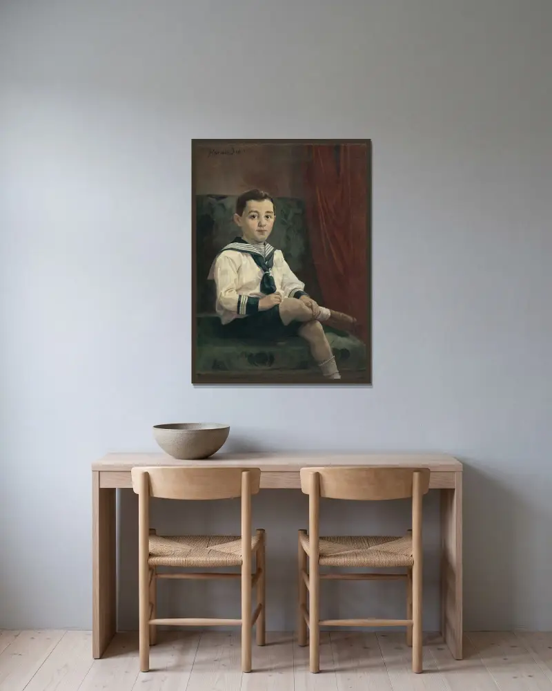 Pojke i sjömanskostym av Jozef Hanula inramad på en vägg